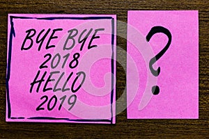 Text sign showing Bye Bye 2018 Hello 2019. Conceptual photo Starting new year Motivational message 2018 is over Violet color black