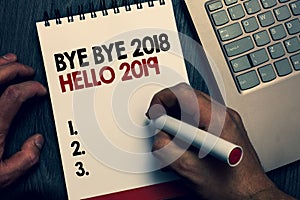 Text sign showing Bye Bye 2018 Hello 2019. Conceptual photo Starting new year Motivational message 2018 is over Written words and