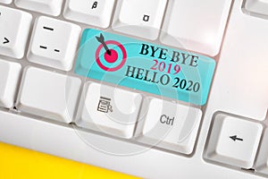 Text sign showing Bye Bye 2019 Hello 2020. Conceptual photo saying goodbye to last year and welcoming another good one White pc