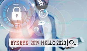 Text sign showing Bye Bye 2019 Hello 2020. Conceptual photo Starting new year Motivational message 2019 is over Male