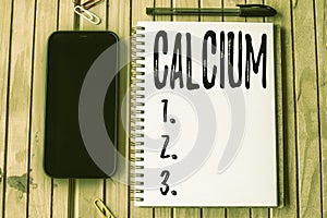 Text sign showing Calcium. Conceptual photo fifth most abundant element in the human body Silverwhite metal Empty Open