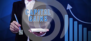 Text sign showing Capital Gains. Conceptual photo Bonds Shares Stocks Profit Income Tax Investment Funds