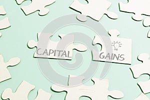 Text sign showing Capital Gains. Conceptual photo Bonds Shares Stocks Profit Income Tax Investment Funds Building An