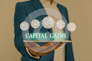 Text sign showing Capital Gains. Conceptual photo Bonds Shares Stocks Profit Income Tax Investment Funds Male human wear