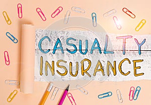 Text sign showing Casualty Insurance. Conceptual photo overage against loss of property or other liabilities Stationary photo