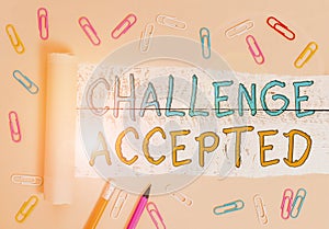 Text sign showing Challenge Accepted. Conceptual photo to participate or undertake in a competitive situation Stationary and torn