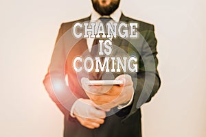 Text sign showing Change Is Coming. Conceptual photo telling someone that future going to be different Male human wear