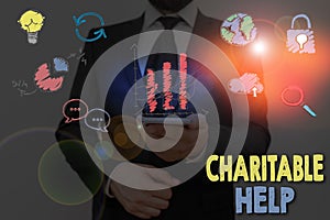 Text sign showing Charitable Help. Conceptual photo system of giving money or help free to those who are in need