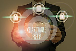 Text sign showing Charitable Help. Conceptual photo system of giving money or help free to those who are in need