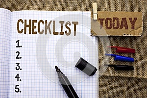 Text sign showing Checklist. Conceptual photo Todolist List Plan Choice Report Feedback Data Questionnaire written on Notebook Boo photo