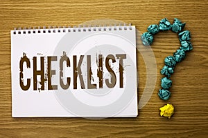 Text sign showing Checklist. Conceptual photo Todolist List Plan Choice Report Feedback Data Questionnaire written on Notebook Boo photo