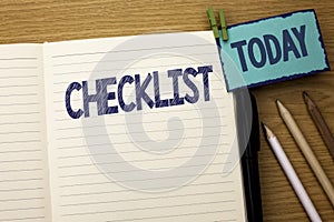 Text sign showing Checklist. Conceptual photo Todolist List Plan Choice Report Feedback Data Questionnaire written on Notebook Boo photo