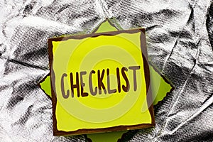 Text sign showing Checklist. Conceptual photo Todolist List Plan Choice Report Feedback Data Questionnaire written on Stacked Stic photo