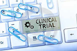 Text sign showing Clinical Trial. Business concept trials to evaluate the effectiveness and safety of medication Typist