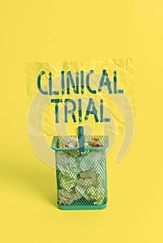 Text sign showing Clinical Trial. Conceptual photo trials to evaluate the effectiveness and safety of medication Trash bin