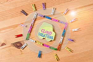 Text sign showing Cloud Solutions. Conceptual photo ondemand services or resources accessed via the internet Colored clothespin photo