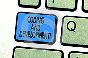 Text sign showing Coding And Development. Conceptual photo To program or create a software or any application Keyboard