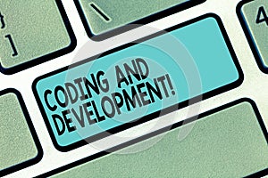 Text sign showing Coding And Development. Conceptual photo To program or create a software or any application Keyboard