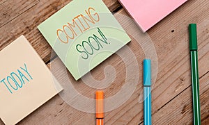 Text sign showing Coming Soon. Conceptual photo event or action that will happen after really short time Note papers and