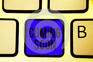 Text sign showing Coming Soon. Conceptual photo something is going to happen in really short time of period Keyboard blue key Inte