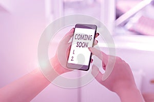 Text sign showing Coming Soon. Conceptual photo something is going to happen soon or after a short time