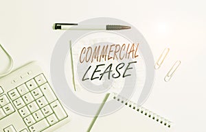 Text sign showing Commercial Lease. Conceptual photo contract between a landlord and a business property tenants White