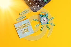 Text sign showing Commercial Lease. Conceptual photo refers to buildings or land intended to generate a profit Metal retro alarm