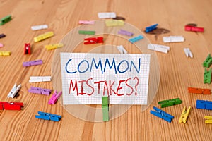 Text sign showing Common Mistakes question. Conceptual photo repeat act or judgement misguided or wrong Colored