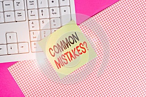 Text sign showing Common Mistakes question. Conceptual photo repeat act or judgement misguided or wrong Note paper stick