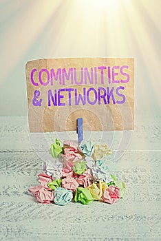 Text sign showing Communities And Networks. Conceptual photo Collaboration of Learnings and Practices of Members Reminder pile