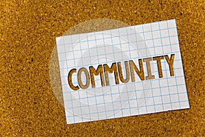 Text sign showing Community. Conceptual photo Neighborhood Association State Affiliation Alliance Unity Group Cork background note