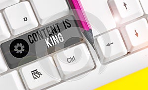 Text sign showing Content Is King. Conceptual photo marketing focused growing visibility non paid search results White pc keyboard