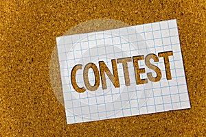 Text sign showing Contest. Conceptual photo Game Tournament Competition Event Trial Conquest Battle Struggle Cork background noteb