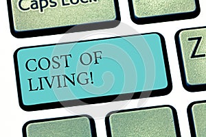 Text sign showing Cost Of Living. Conceptual photo The level of prices relating to a range of everyday items Keyboard