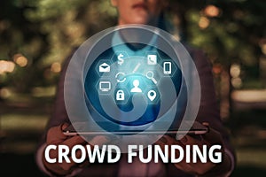 Text sign showing Crowd Funding. Conceptual photo Fundraising Kickstarter Startup Pledge Platform Donations.