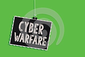 Text sign showing Cyber Warfare. Conceptual photo Virtual War Hackers System Attacks Digital Thief Stalker Hanging blackboard mess