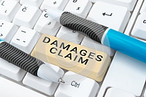 Text sign showing Damages Claim. Conceptual photo Demand Compensation Litigate Insurance File Suit