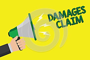 Text sign showing Damages Claim. Conceptual photo Demand Compensation Litigate Insurance File Suit Man holding megaphone loudspeak