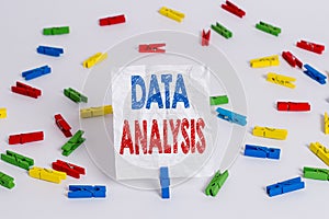 Text sign showing Data Analysis. Conceptual photo Translate numbers to Analytical Conclusion Forecasting Colored clothespin papers