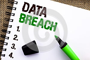 Text sign showing Data Breach. Conceptual photo Stolen Cybercrime Information Hacking Security Malicious Crack written on Notebook