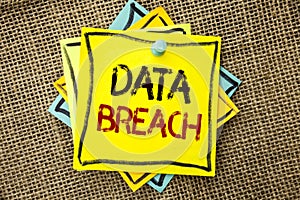Text sign showing Data Breach. Conceptual photo Stolen Cybercrime Information Hacking Security Malicious Crack written on Sticky N