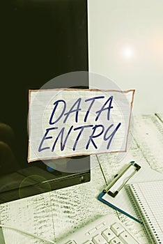 Text sign showing Data Entry. Conceptual photo process of inputting data or information into the computer Note paper