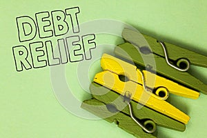 Text sign showing Debt Relief. Conceptual photo partial or total remission of it especially those by countries Three green yellow