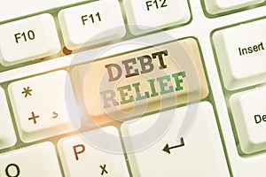 Text sign showing Debt Relief. Conceptual photo a reduction in the amount of debt that a country has to pay