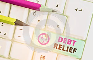 Text sign showing Debt Relief. Conceptual photo a reduction in the amount of debt that a country has to pay.