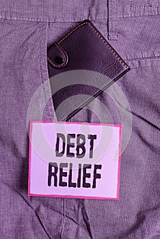 Text sign showing Debt Relief. Conceptual photo a reduction in the amount of debt that a country has to pay Small little wallet