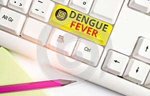 Text sign showing Dengue Fever. Conceptual photo infectious disease caused by a flavivirus or aedes mosquitoes White pc photo