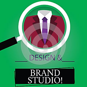 Text sign showing Design And Brand Studio. Conceptual photo Modern designing space professional office Magnifying Glass