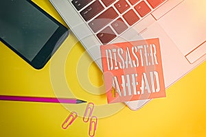 Text sign showing Disaster Ahead. Conceptual photo Contingency Planning Forecasting a disaster or incident Trendy laptop