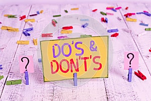 Text sign showing Do S And Don T S. Conceptual photo Confusion in one s is mind about something Scribbled and crumbling sheet with